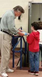 Jim Arnosky speaking with child