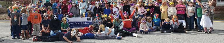 All students enjoy a picture in their masks for the annual SCS mask parade!